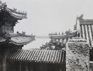 Details of pavilion roof, with Shiqikong Bridge (十七孔橋) in the background, Summer Palace, Beijing
