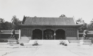 Visitors in a building in the Forbidden City, Beijing