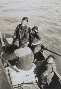 Men and boys on a boat