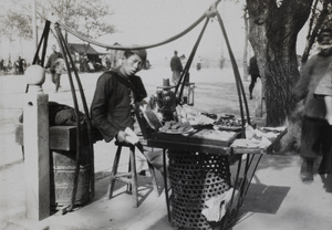  A sweet seller with his travelling shop