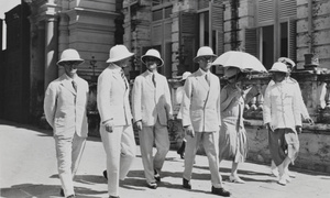 A group of men and lady walking in the street, Bangkok