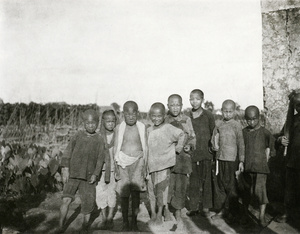 Group of children by a field