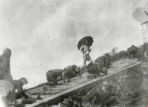 Pilgrims ascending Han Yoh Shan on their knees, Hunan
