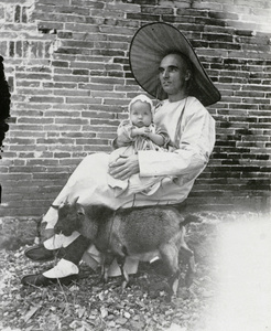 Archdeacon Byrde and Christine, with a goat