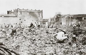 People sifting through debris and rubble, Hankow