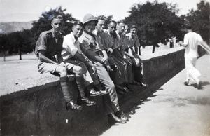 Group sitting on a wall, Weihaiwei