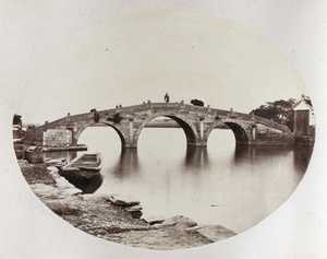 A three-arched bridge over a canal, near Ningbo
