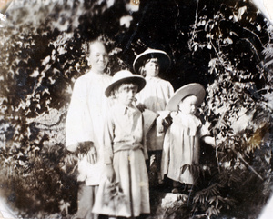 Gwen, Phyllis and Jim Carrall, with their amah