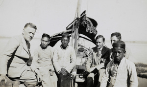 Fred Cottrell and Charlie Steele with others, on a boat