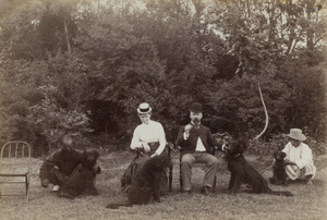 D.M. Henderson with his wife Edith, servants and dogs
