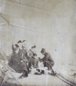Four European ladies being tended by a servant, Hong Kong