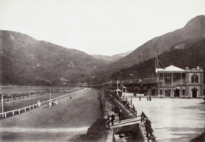 Horses on the tracks of the Happy Valley Racecourse, Hong Kong