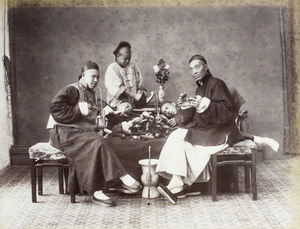 Studio photograph of opium smoking, Hong kong