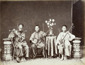 Studio photograph of three Chinese musicians with Chinese flute and Erhu (二胡), Hong Kong