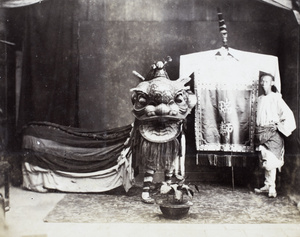 Studio photograph of lion dancers in costume