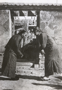 Two men greeting each other formally