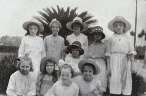 Betsy Elliott with a group of unidentified  girls