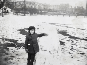 Marjorie Ephrave and snow mound, Public Garden, Shanghai, January 1931