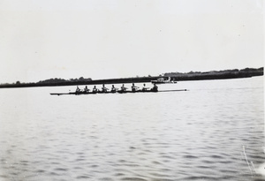Men's eight rowing on the Huangpu river