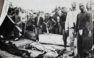Executed men, with coffins