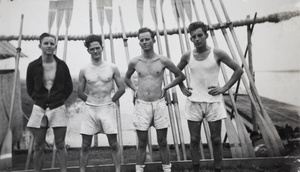 Four Shanghai Rowing Club members, with oars