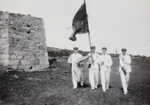 F. Hagger holding a flag, with other sailors, Weihai (威海)