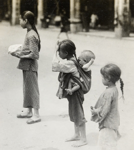 Four children in a street, Hong Kong