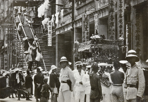 Carrying a coffin down temporary stairs, Hong Kong