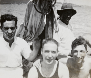 F. Hagger with other men on a boat, Weihai (威海)
