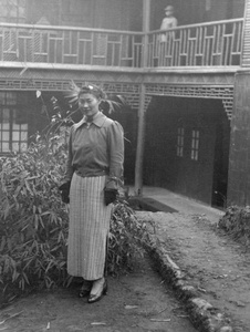 Wang Dezhen in front of a building, Northern Hot Springs Park