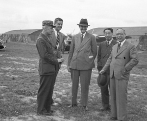 Fu Bingchang and Hu Shize with other political and military officials at an airfield, Moscow