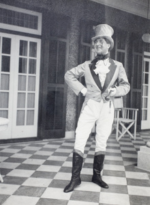George Johnson, in fancy dress as 'Johnnie Walker' Whiskey striding man, Shanghai