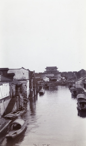 Loumen, a water gate in the north-east of Suzhou, and boats on the moat
