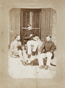 Harry, Walter and Guy Hillier, with three dogs