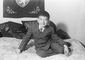 Jim Hutchinson, wearing a suit, Shanghai