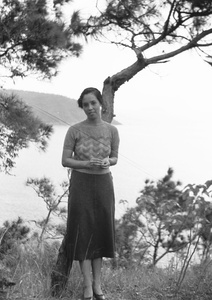 Elsie Markham in a scenic area above a Castle Peak Road beach, Hong Kong