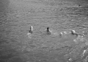 Group of friends swimming, Hong Kong
