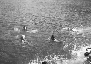 Group of friends swimming, Hong Kong