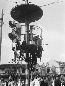 Bomb damage to traffic light tower at junction of Thibet Road and Boulevard de Montigny, Shanghai, August 1937
