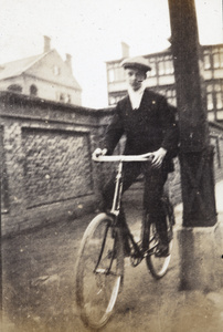 George Danson on a bicycle, Shanghai