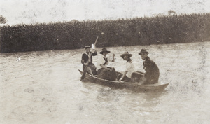 Two men and two women in a punt, Shanghai