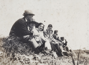 John Piry, Hannah and a group of friends sitting on the bank of river, Shanghai