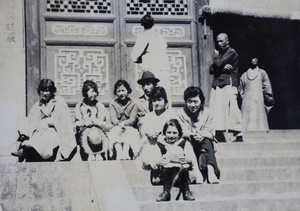 Tom Hutchinson with a group of women on the steps to Lingyin Temple, Hangzhou
