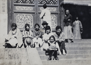Tom Hutchinson with a group of women on the steps to Lingyin Temple, Hangzhou