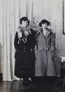 Nellie and Molly Noble wearing winter coats and fur collars, Shanghai