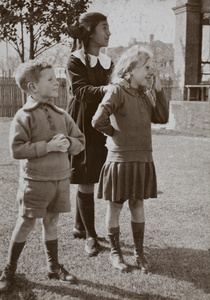 Maggie Hutchinson with two neighbouring children in the garden of 35 Tongshan Road, Hongkou, Shanghai