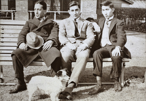 Three fashionable young men, John Piry, Charles and Tom Hutchinson, and a dog, 35 Tongshan Road, Hongkou, Shanghai