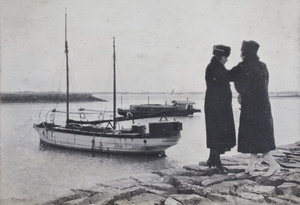 Two young women on a stone jetty, Wusong, February 1920