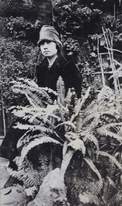 Young woman in a glasshouse, Shanghai