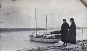 Two young women on a stone jetty, Wusong, February 1920